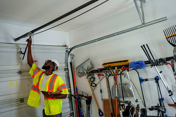 Professional Garage Door technician working in Experiment, GA